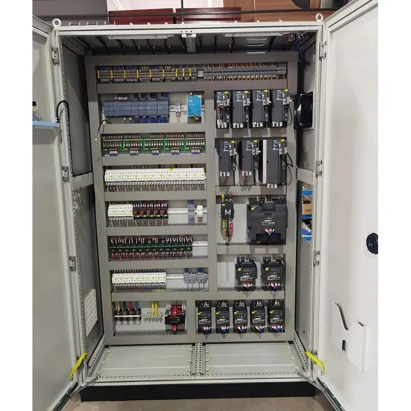 A modern industrial control panel with organized components, drives, and clean DIN-rail wiring